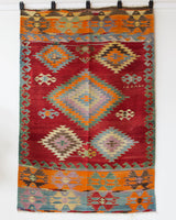 Vintage kilim rug in living room setting, bright colors, wild shaman, soft rug, bold color, Portland, Oregon, rug store, rug shop, local shop, vintage rug, modern kilim, warm colors