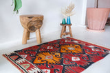 Vintage mini kilim rug in room decor setting, kilim, Turkish rug, vintage rug, portland, rug shop, bright colors, wild shaman, soft rug, bold color, Portland, Oregon, rug store, rug shop, local shop