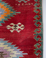 Vintage kilim rug in living room setting, bright colors, wild shaman, soft rug, bold color, Portland, Oregon, rug store, rug shop, local shop, vintage rug, modern kilim, warm colors