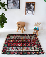 Vintage mini kilim rug in room decor setting, kilim, Turkish rug, vintage rug, portland, rug shop, bright colors, wild shaman, soft rug, bold color, Portland, Oregon, rug store, rug shop, local shop