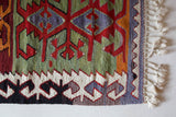 Vintage mini kilim rug in room decor setting, kilim, Turkish rug, vintage rug, portland, rug shop, bright colors, wild shaman, soft rug, bold color, Portland, Oregon, rug store, rug shop, local shop