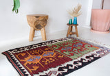 Vintage mini kilim rug in room decor setting, kilim, Turkish rug, vintage rug, portland, rug shop, bright colors, wild shaman, soft rug, bold color, Portland, Oregon, rug store, rug shop, local shop