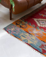 Vintage kilim rug in living room setting, bright colors, wild shaman, soft rug, bold color, Portland, Oregon, rug store, rug shop, local shop, vintage rug, modern kilim, warm colors