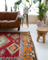 Vintage kilim rug in living room setting, bright colors, wild shaman, soft rug, bold color, Portland, Oregon, rug store, rug shop, local shop, vintage rug, modern kilim, warm colors