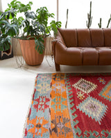 Vintage kilim rug in living room setting, bright colors, wild shaman, soft rug, bold color, Portland, Oregon, rug store, rug shop, local shop, vintage rug, modern kilim, warm colors
