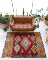 Vintage kilim rug in living room setting, bright colors, wild shaman, soft rug, bold color, Portland, Oregon, rug store, rug shop, local shop, vintage rug, modern kilim, warm colors
