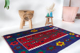 Vintage mini kilim rug in room decor setting, kilim, Turkish rug, vintage rug, portland, rug shop, bright colors, wild shaman, soft rug, bold color, Portland, Oregon, rug store, rug shop, local shop