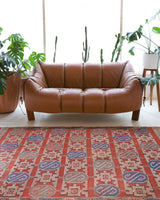 Vintage kilim rug in room decor setting, old rug, antique rug, pastel colors, faded colors, Turkish rug, vintage rug, soft rug, Portland, Oregon, rug store, rug shop, local shop, bold colors, bright colors, faded colors