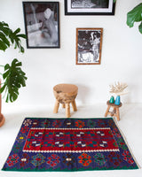 Vintage mini kilim rug in room decor setting, kilim, Turkish rug, vintage rug, portland, rug shop, bright colors, wild shaman, soft rug, bold color, Portland, Oregon, rug store, rug shop, local shop
