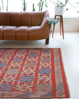 Vintage kilim rug in room decor setting, old rug, antique rug, pastel colors, faded colors, Turkish rug, vintage rug, soft rug, Portland, Oregon, rug store, rug shop, local shop, bold colors, bright colors, faded colors