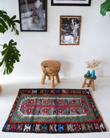 Vintage mini kilim rug in room decor setting, kilim, Turkish rug, vintage rug, portland, rug shop, bright colors, wild shaman, soft rug, bold color, Portland, Oregon, rug store, rug shop, local shop