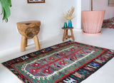 Vintage mini kilim rug in room decor setting, kilim, Turkish rug, vintage rug, portland, rug shop, bright colors, wild shaman, soft rug, bold color, Portland, Oregon, rug store, rug shop, local shop