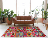 Vintage kilim rug in living room setting, bright colors, wild shaman, soft rug, bold color, Portland, Oregon, rug store, rug shop, local shop, vintage rug, modern kilim, warm colors