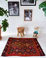 Vintage mini kilim rug in room decor setting, kilim, Turkish rug, vintage rug, portland, rug shop, bright colors, wild shaman, soft rug, bold color, Portland, Oregon, rug store, rug shop, local shop