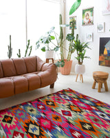 Vintage kilim rug in living room setting, bright colors, wild shaman, soft rug, bold color, Portland, Oregon, rug store, rug shop, local shop, vintage rug, modern kilim, warm colors