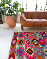 Vintage kilim rug in living room setting, bright colors, wild shaman, soft rug, bold color, Portland, Oregon, rug store, rug shop, local shop, vintage rug, modern kilim, warm colors