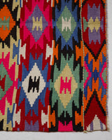 Vintage kilim rug in living room setting, bright colors, wild shaman, soft rug, bold color, Portland, Oregon, rug store, rug shop, local shop, vintage rug, modern kilim, warm colors