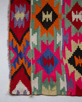 Vintage kilim rug in living room setting, bright colors, wild shaman, soft rug, bold color, Portland, Oregon, rug store, rug shop, local shop, vintage rug, modern kilim, warm colors