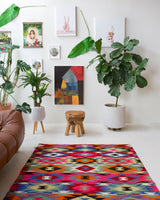 Vintage kilim rug in living room setting, bright colors, wild shaman, soft rug, bold color, Portland, Oregon, rug store, rug shop, local shop, vintage rug, modern kilim, warm colors