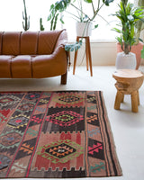 Vintage kilim rug in living room setting, bright colors, wild shaman, soft rug, bold color, Portland, Oregon, rug store, rug shop, local shop, vintage rug, modern kilim, warm colors