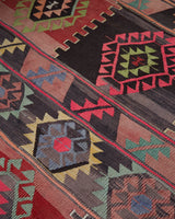 Vintage kilim rug in living room setting, bright colors, wild shaman, soft rug, bold color, Portland, Oregon, rug store, rug shop, local shop, vintage rug, modern kilim, warm colors