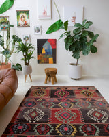Vintage kilim rug in living room setting, bright colors, wild shaman, soft rug, bold color, Portland, Oregon, rug store, rug shop, local shop, vintage rug, modern kilim, warm colors
