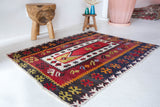 Vintage mini kilim rug in room decor setting, kilim, Turkish rug, vintage rug, portland, rug shop, bright colors, wild shaman, soft rug, bold color, Portland, Oregon, rug store, rug shop, local shop