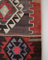 Vintage kilim rug in living room setting, bright colors, wild shaman, soft rug, bold color, Portland, Oregon, rug store, rug shop, local shop, vintage rug, modern kilim, warm colors