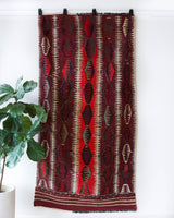 Vintage Turkish rug in a living room setting, pile rug, Turkish rug, vintage rug, portland, rug shop, bright colors, wild shaman, soft rug, bold color, Portland, Oregon, rug store, rug shop, local shop, antique rug