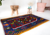 Vintage mini kilim rug in room decor setting, kilim, Turkish rug, vintage rug, portland, rug shop, bright colors, wild shaman, soft rug, bold color, Portland, Oregon, rug store, rug shop, local shop
