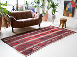 Vintage Turkish rug in a living room setting, pile rug, Turkish rug, vintage rug, portland, rug shop, bright colors, wild shaman, soft rug, bold color, Portland, Oregon, rug store, rug shop, local shop, antique rug