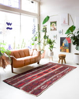 Vintage Turkish rug in a living room setting, pile rug, Turkish rug, vintage rug, portland, rug shop, bright colors, wild shaman, soft rug, bold color, Portland, Oregon, rug store, rug shop, local shop, antique rug