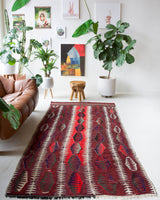Vintage Turkish rug in a living room setting, pile rug, Turkish rug, vintage rug, portland, rug shop, bright colors, wild shaman, soft rug, bold color, Portland, Oregon, rug store, rug shop, local shop, antique rug