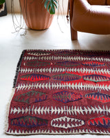 Vintage Turkish rug in a living room setting, pile rug, Turkish rug, vintage rug, portland, rug shop, bright colors, wild shaman, soft rug, bold color, Portland, Oregon, rug store, rug shop, local shop, antique rug