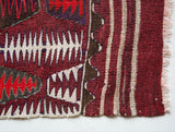 Vintage Turkish rug in a living room setting, pile rug, Turkish rug, vintage rug, portland, rug shop, bright colors, wild shaman, soft rug, bold color, Portland, Oregon, rug store, rug shop, local shop, antique rug
