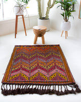 Vintage mini kilim rug in room decor setting, kilim, Turkish rug, vintage rug, portland, rug shop, bright colors, wild shaman, soft rug, bold color, Portland, Oregon, rug store, rug shop, local shop