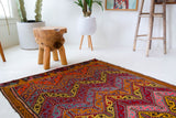 Vintage mini kilim rug in room decor setting, kilim, Turkish rug, vintage rug, portland, rug shop, bright colors, wild shaman, soft rug, bold color, Portland, Oregon, rug store, rug shop, local shop
