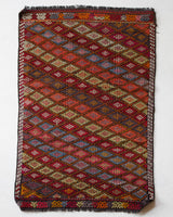 Vintage mini kilim rug in room decor setting, kilim, Turkish rug, vintage rug, portland, rug shop, bright colors, wild shaman, soft rug, bold color, Portland, Oregon, rug store, rug shop, local shop