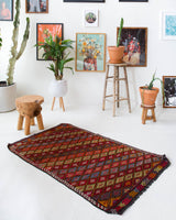 Vintage mini kilim rug in room decor setting, kilim, Turkish rug, vintage rug, portland, rug shop, bright colors, wild shaman, soft rug, bold color, Portland, Oregon, rug store, rug shop, local shop