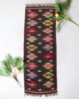 Vintage Turkish runner rug in a living room setting, pile rug, Turkish rug, vintage rug, portland, rug shop, bright colors, wild shaman, soft rug, bold color, Portland, Oregon, rug store, rug shop, local shop, antique rug