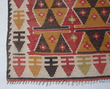 Vintage Turkish mini rug in room decor setting, old rug, antique rug, pastel colors, faded colors, Turkish rug, vintage rug, soft rug, Portland, Oregon, rug store, rug shop, local shop,  bright colors, bold colors