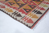 Vintage Turkish mini rug in room decor setting, old rug, antique rug, pastel colors, faded colors, Turkish rug, vintage rug, soft rug, Portland, Oregon, rug store, rug shop, local shop,  bright colors, bold colors