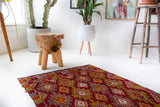 Vintage mini kilim rug in room decor setting, kilim, Turkish rug, vintage rug, portland, rug shop, bright colors, wild shaman, soft rug, bold color, Portland, Oregon, rug store, rug shop, local shop