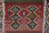 Vintage Turkish mini rug in room decor setting, old rug, antique rug, pastel colors, faded colors, Turkish rug, vintage rug, soft rug, Portland, Oregon, rug store, rug shop, local shop,  bright colors, bold colors