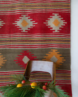 Vintage kilim rug in room decor setting, old rug, antique rug, pastel colors, faded colors, Turkish rug, vintage rug, soft rug, Portland, Oregon, rug store, rug shop, local shop, bold colors, bright colors, faded colors