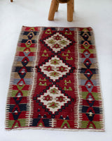 Vintage mini kilim rug in room decor setting, kilim, Turkish rug, vintage rug, portland, rug shop, bright colors, wild shaman, soft rug, bold color, Portland, Oregon, rug store, rug shop, local shop