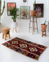 Vintage mini kilim rug in room decor setting, kilim, Turkish rug, vintage rug, portland, rug shop, bright colors, wild shaman, soft rug, bold color, Portland, Oregon, rug store, rug shop, local shop