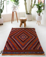 Vintage mini kilim rug in room decor setting, kilim, Turkish rug, vintage rug, portland, rug shop, bright colors, wild shaman, soft rug, bold color, Portland, Oregon, rug store, rug shop, local shop