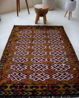 Vintage kilim rug in living room setting, bright colors, wild shaman, soft rug, bold color, Portland, Oregon, rug store, rug shop, local shop, vintage rug, modern kilim, warm colors