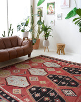 Vintage kilim rug in room decor setting, old rug, antique rug, pastel colors, faded colors, Turkish rug, vintage rug, soft rug, Portland, Oregon, rug store, rug shop, local shop, bold colors, bright colors, faded colors